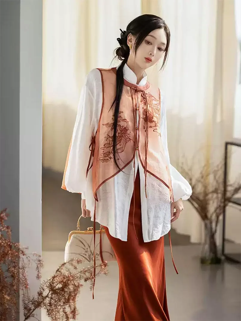 Modernised hanfu with embroidered vest, mandarin collar shirt, and fishtail skirt in orange autumn style