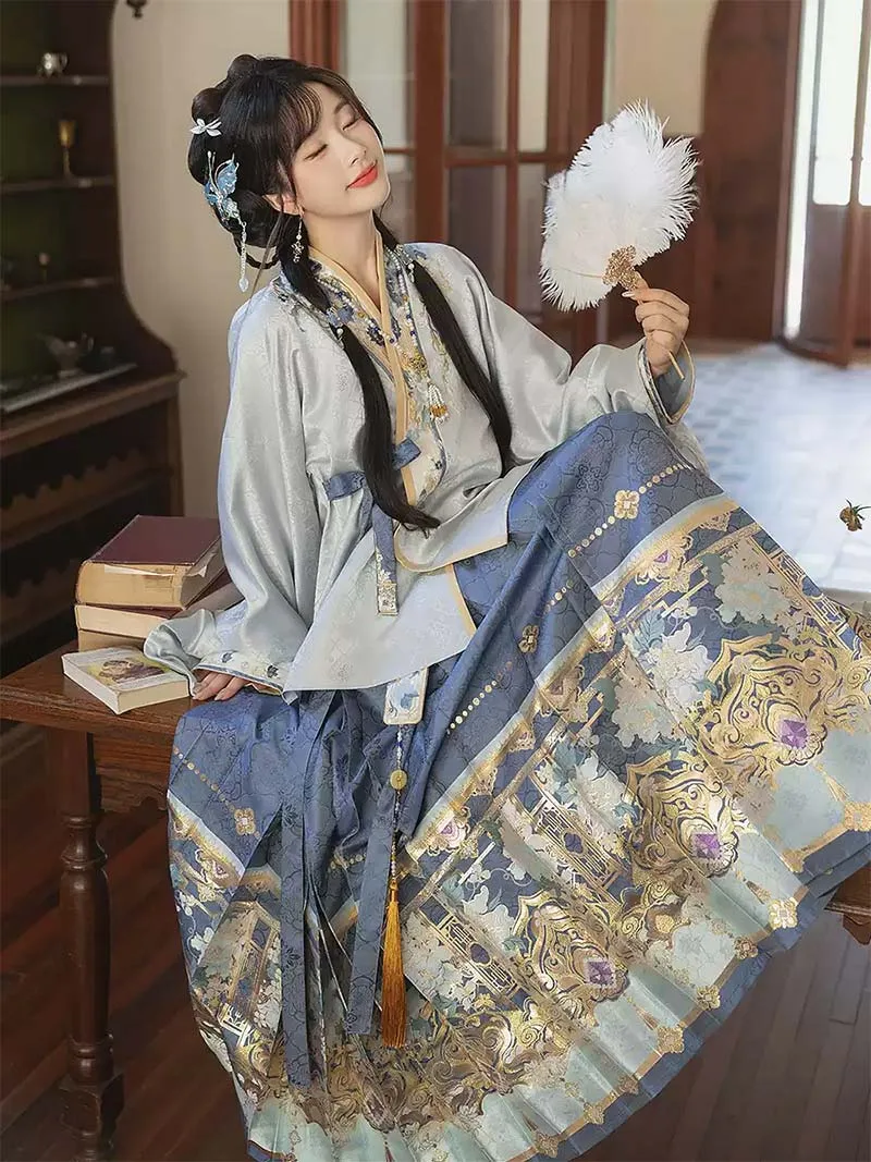 Original Ming-style Hanfu set with blue brocade Mamian Qun skirt and cross-collar short jacket for winter wear