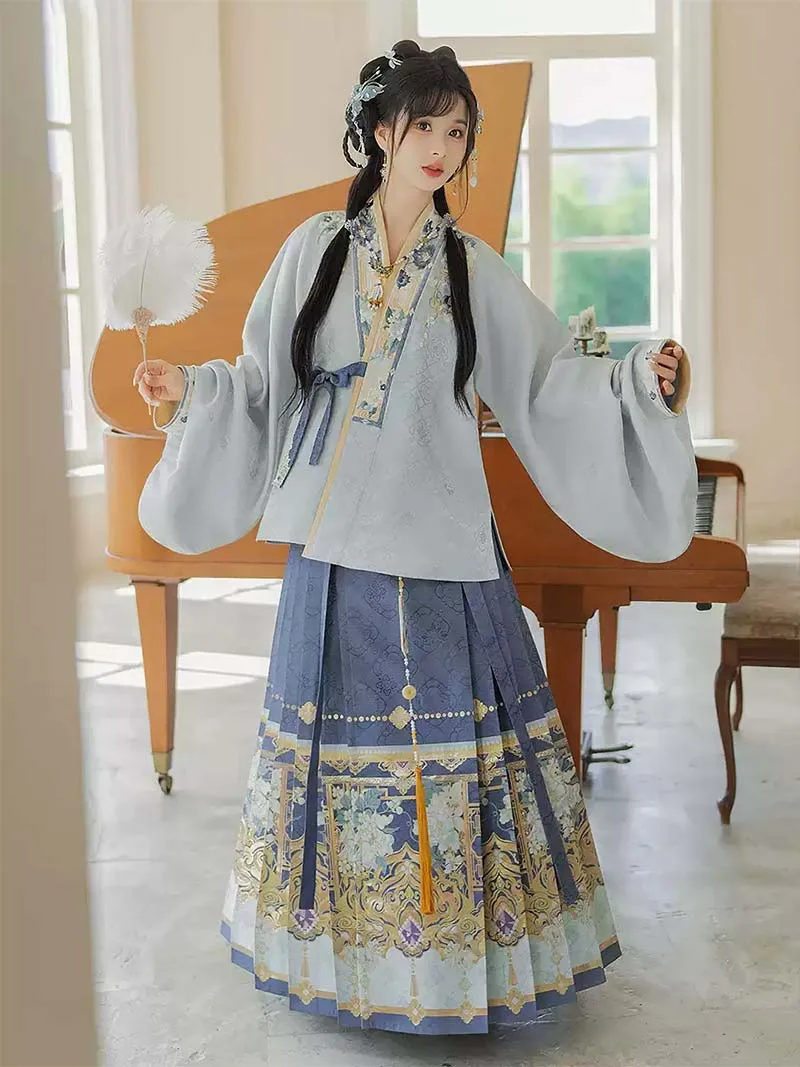 Original Ming-style Hanfu set with blue brocade Mamian Qun skirt and cross-collar short jacket for winter wear