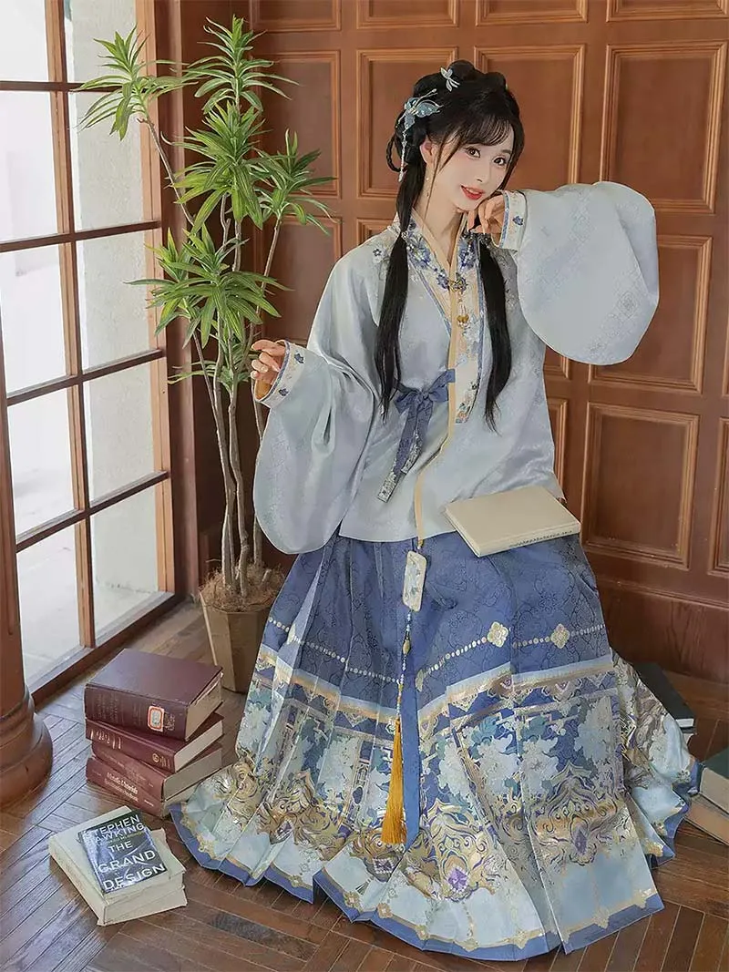 Original Ming-style Hanfu set with blue brocade Mamian Qun skirt and cross-collar short jacket for winter wear