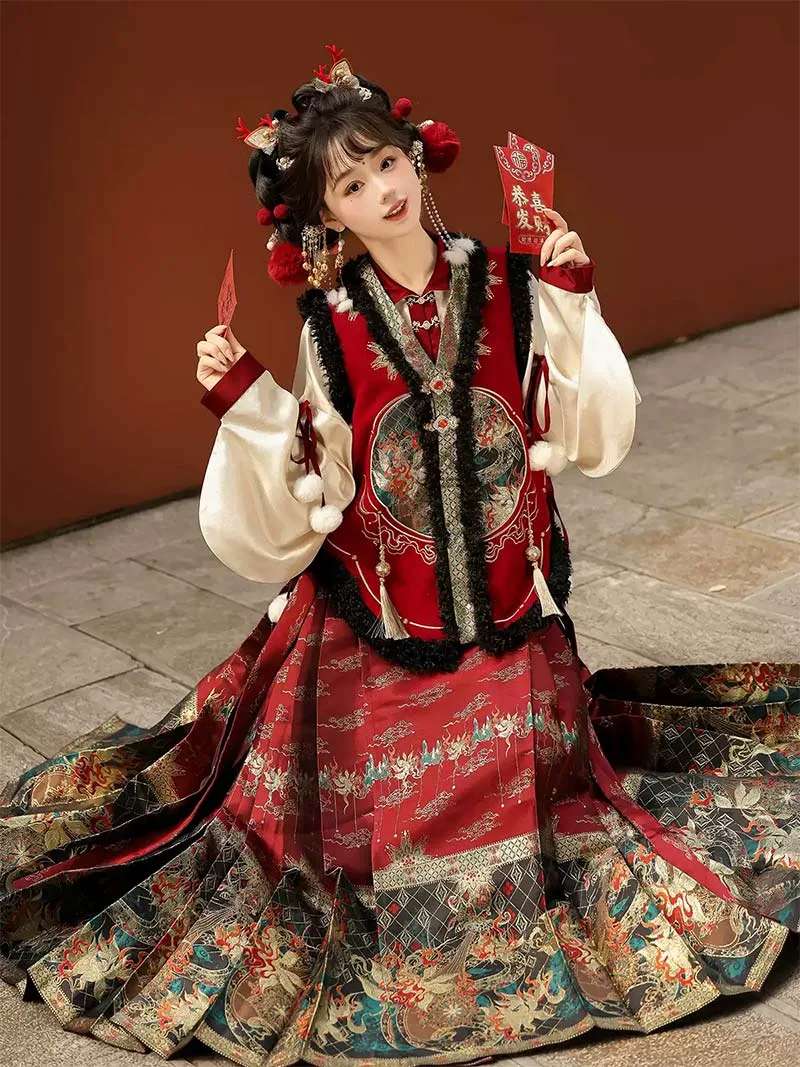 Modern hanfu female outfit with pipa sleeves, brocade mamian skirt, and festive vest top