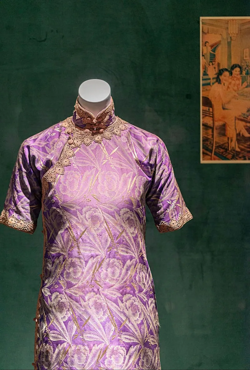 Elegant Chinese qipao dress featuring traditional embroidery and a graceful silhouette, symbolizing timeless oriental beauty.