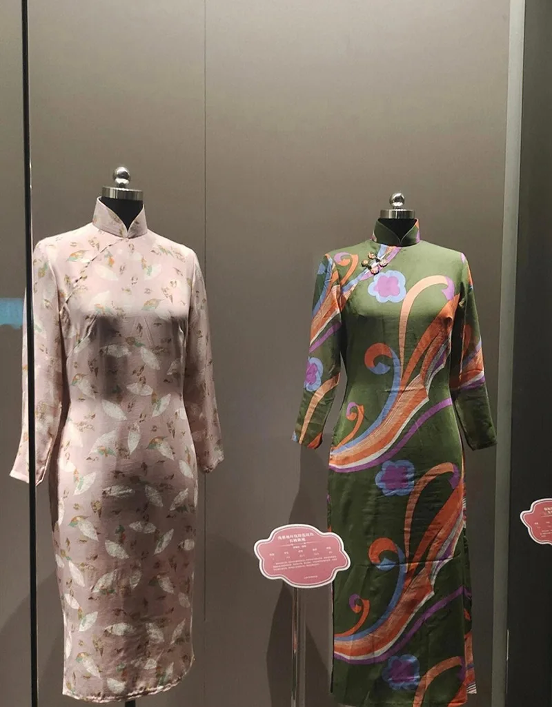 Elegant Chinese qipao dress featuring traditional embroidery and a graceful silhouette, symbolizing timeless oriental beauty.
