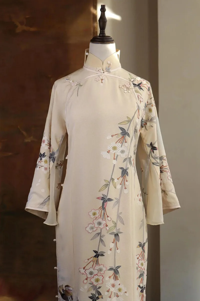 Elegant Chinese qipao dress featuring traditional embroidery and a graceful silhouette, symbolizing timeless oriental beauty.