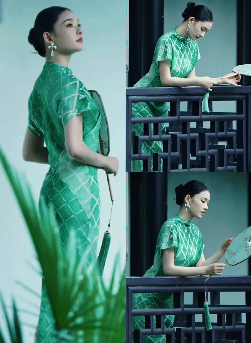 Elegant Chinese qipao dress featuring traditional embroidery and a graceful silhouette, symbolizing timeless oriental beauty.