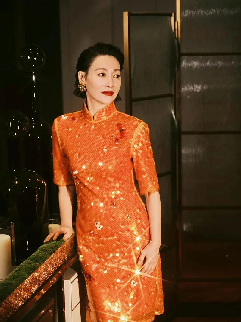 Elegant Chinese qipao dress featuring traditional embroidery and a graceful silhouette, symbolizing timeless oriental beauty.