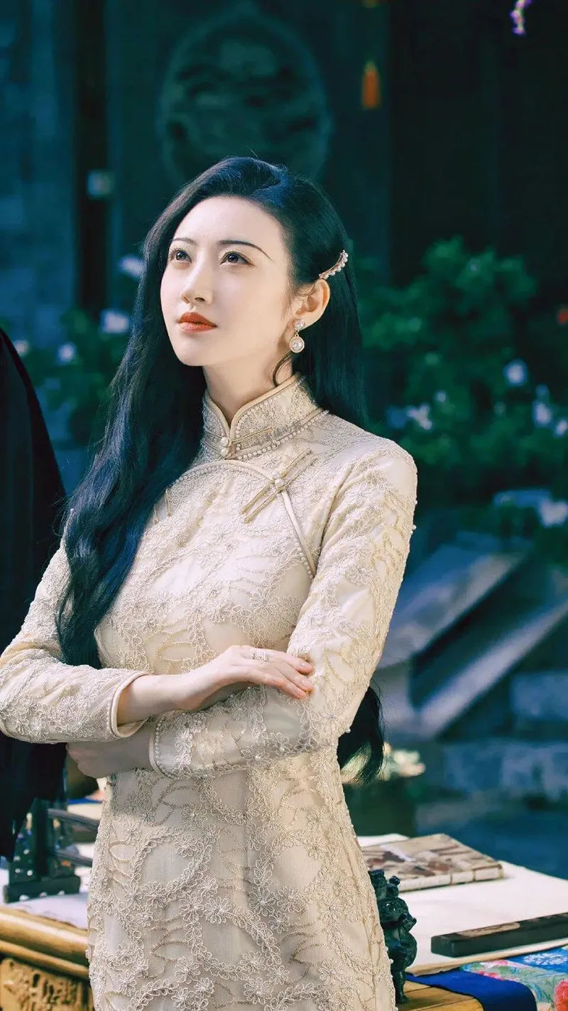 Elegant Chinese qipao dress featuring traditional embroidery and a graceful silhouette, symbolizing timeless oriental beauty.