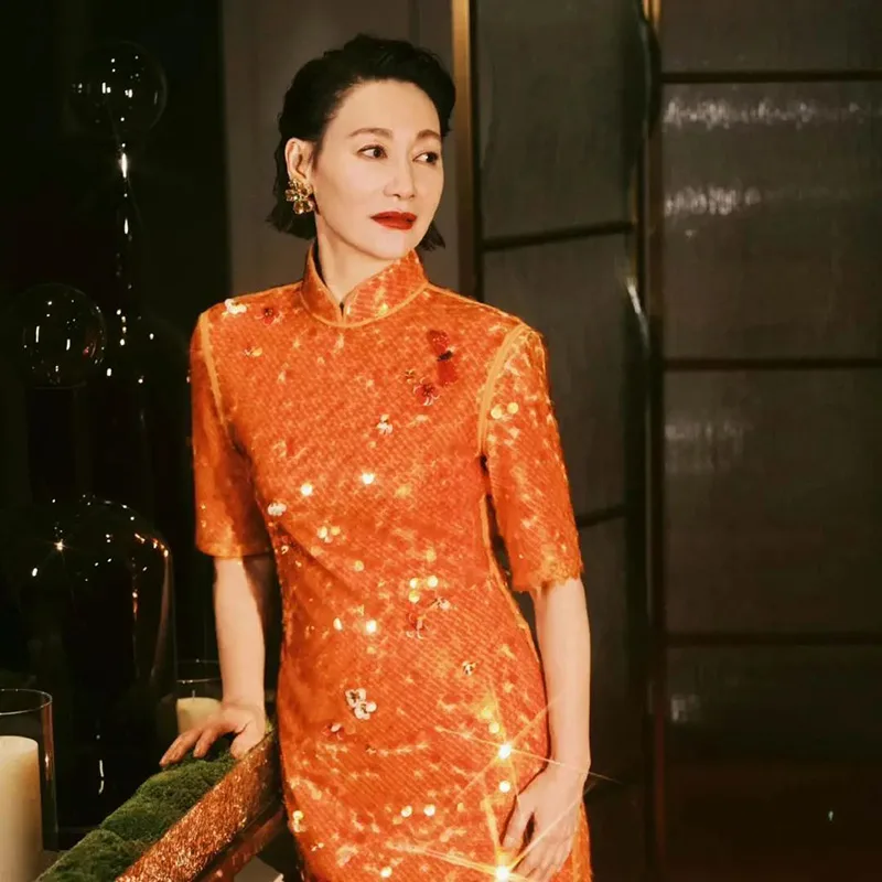 Elegant Chinese qipao dress featuring traditional embroidery and a graceful silhouette, symbolizing timeless oriental beauty.
