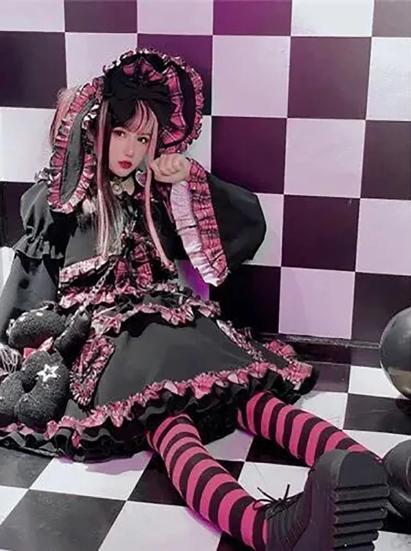 Beautiful Lolita dress featuring lace, ruffles, and bow details, showcasing a sweet and elegant princess style.
