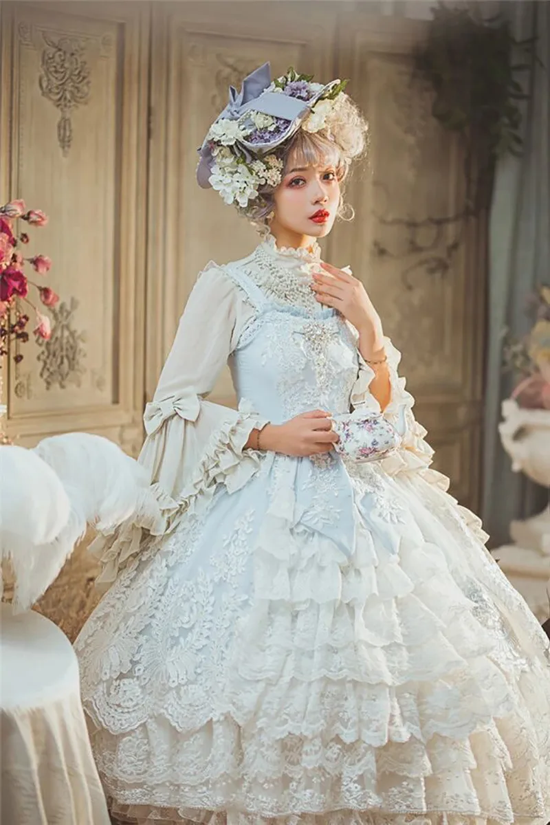 Beautiful Lolita dress featuring lace, ruffles, and bow details, showcasing a sweet and elegant princess style.