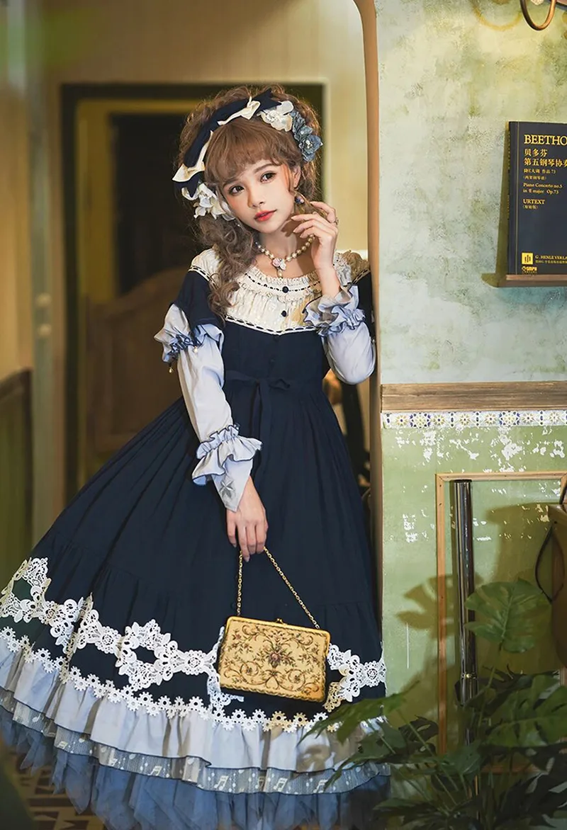 Beautiful Lolita dress featuring lace, ruffles, and bow details, showcasing a sweet and elegant princess style.