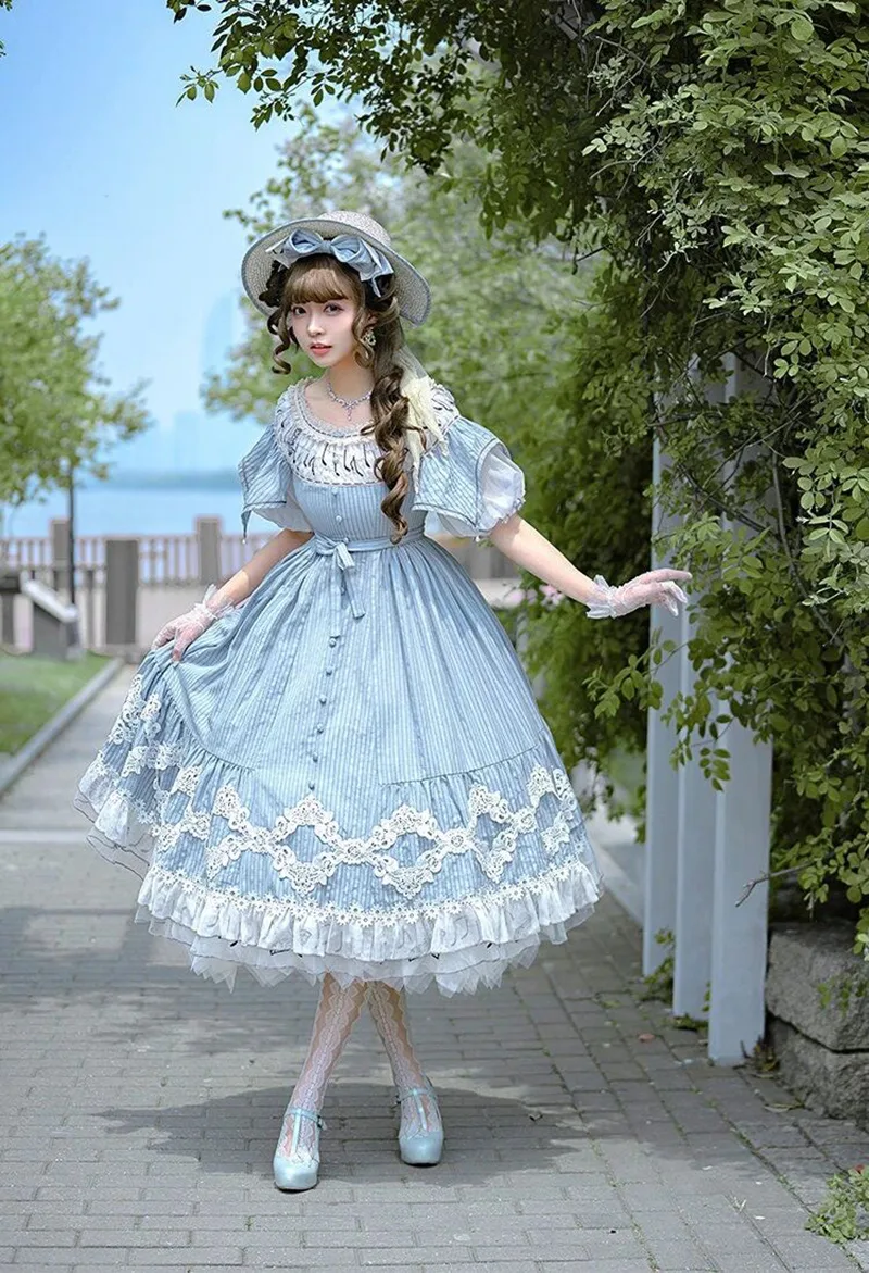 Beautiful Lolita dress featuring lace, ruffles, and bow details, showcasing a sweet and elegant princess style.