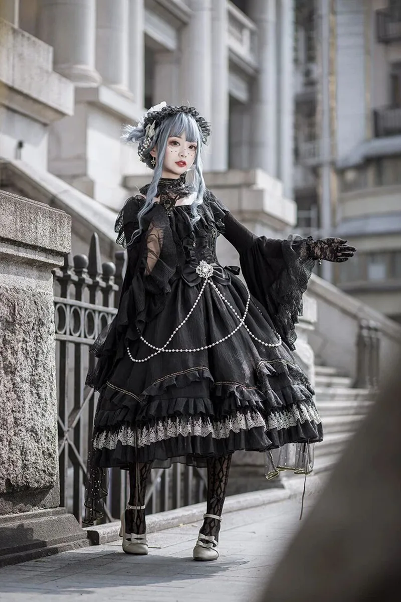 Beautiful Lolita dress featuring lace, ruffles, and bow details, showcasing a sweet and elegant princess style.