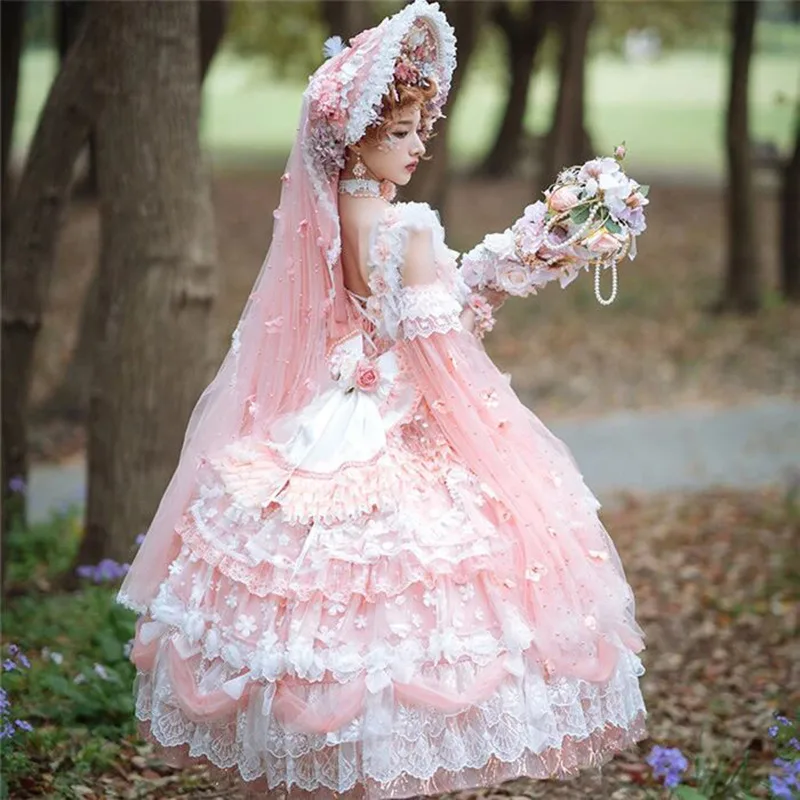 Beautiful Lolita dress featuring lace, ruffles, and bow details, showcasing a sweet and elegant princess style.
