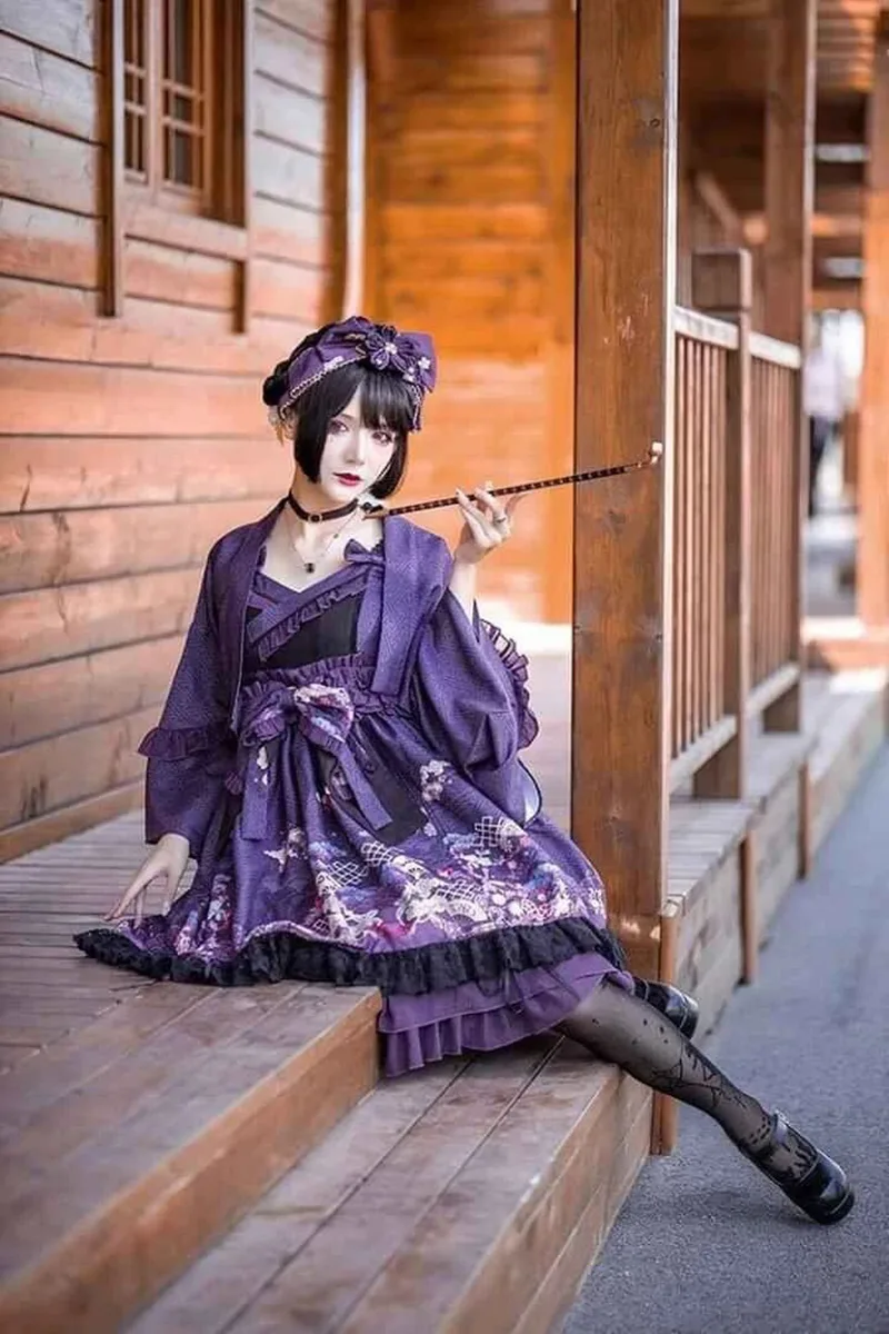 Beautiful Lolita dress featuring lace, ruffles, and bow details, showcasing a sweet and elegant princess style.