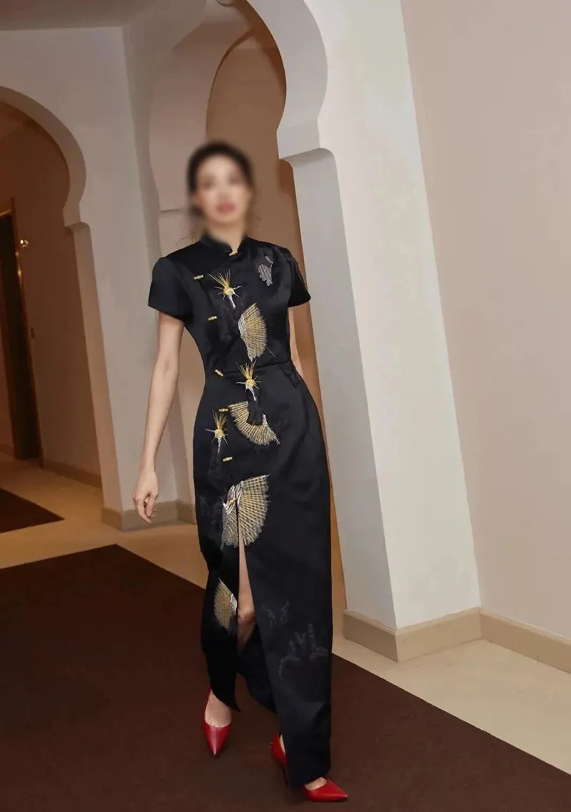 Elegant Chinese qipao dress with traditional embroidery, showcasing classic Asian fashion and cultural heritage.