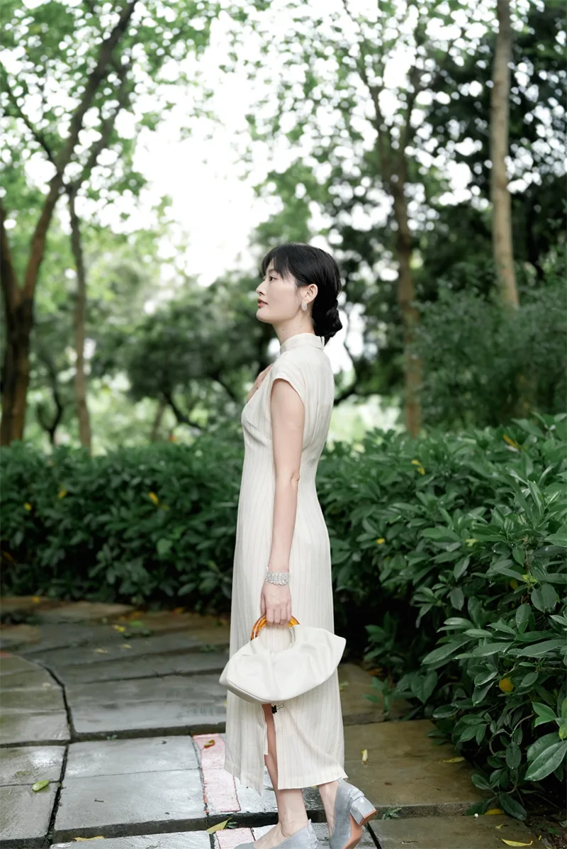 Elegant Chinese qipao dress with traditional embroidery, showcasing classic Asian fashion and cultural heritage.