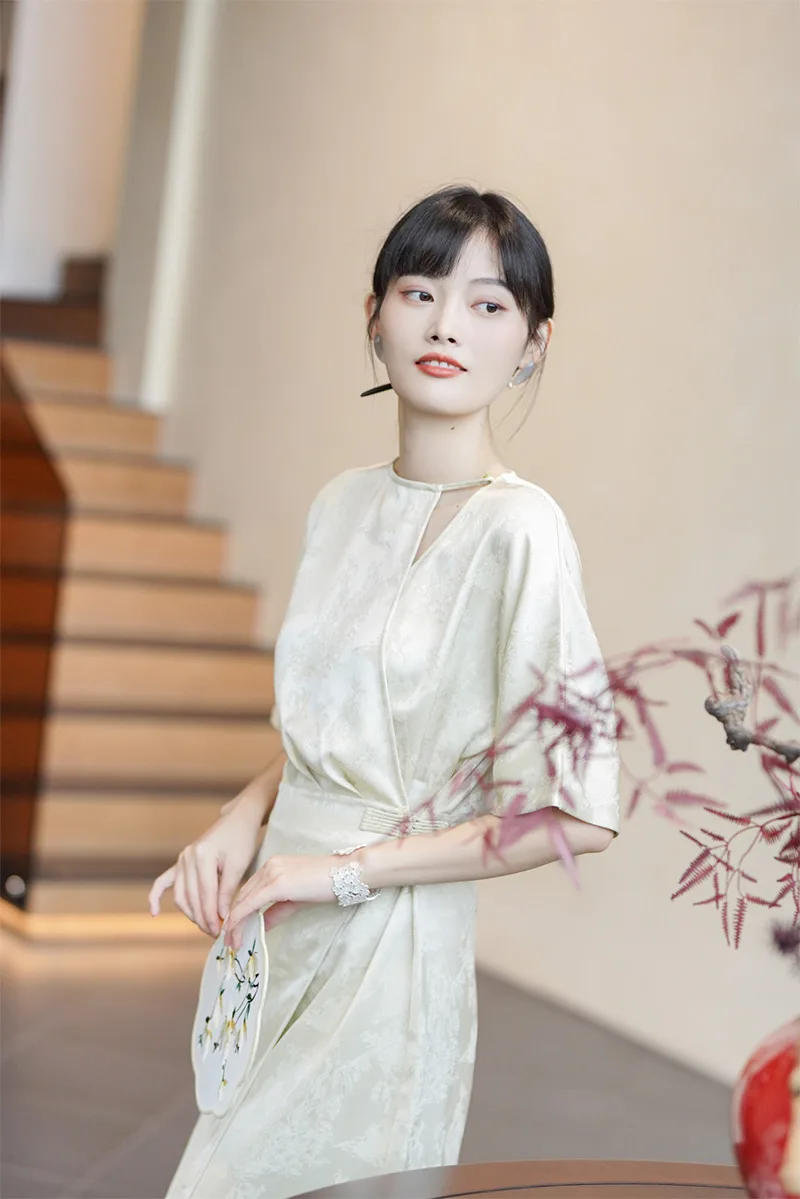 Elegant Chinese qipao dress with traditional embroidery, showcasing classic Asian fashion and cultural heritage.