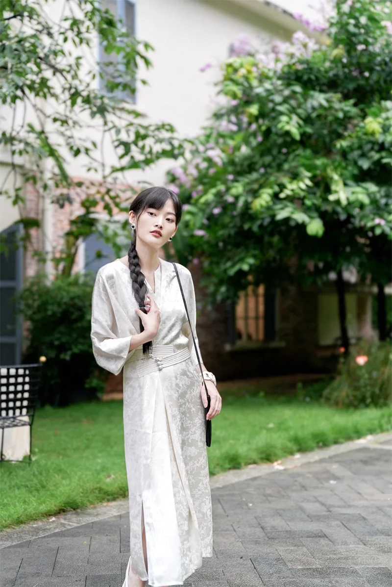 Elegant Chinese qipao dress with traditional embroidery, showcasing classic Asian fashion and cultural heritage.