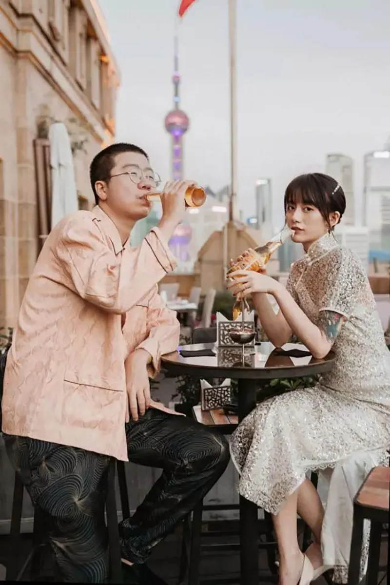 Modern bride in a qipao wedding dress inspired by Chinese elegance