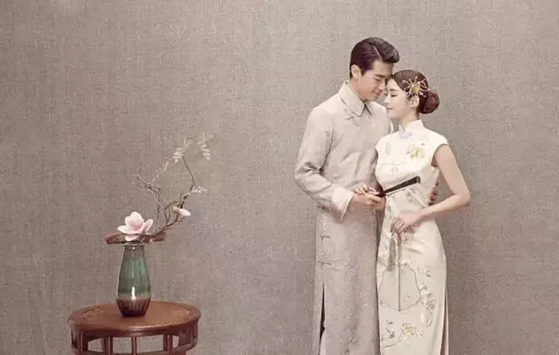 Modern bride in a qipao wedding dress inspired by Chinese elegance