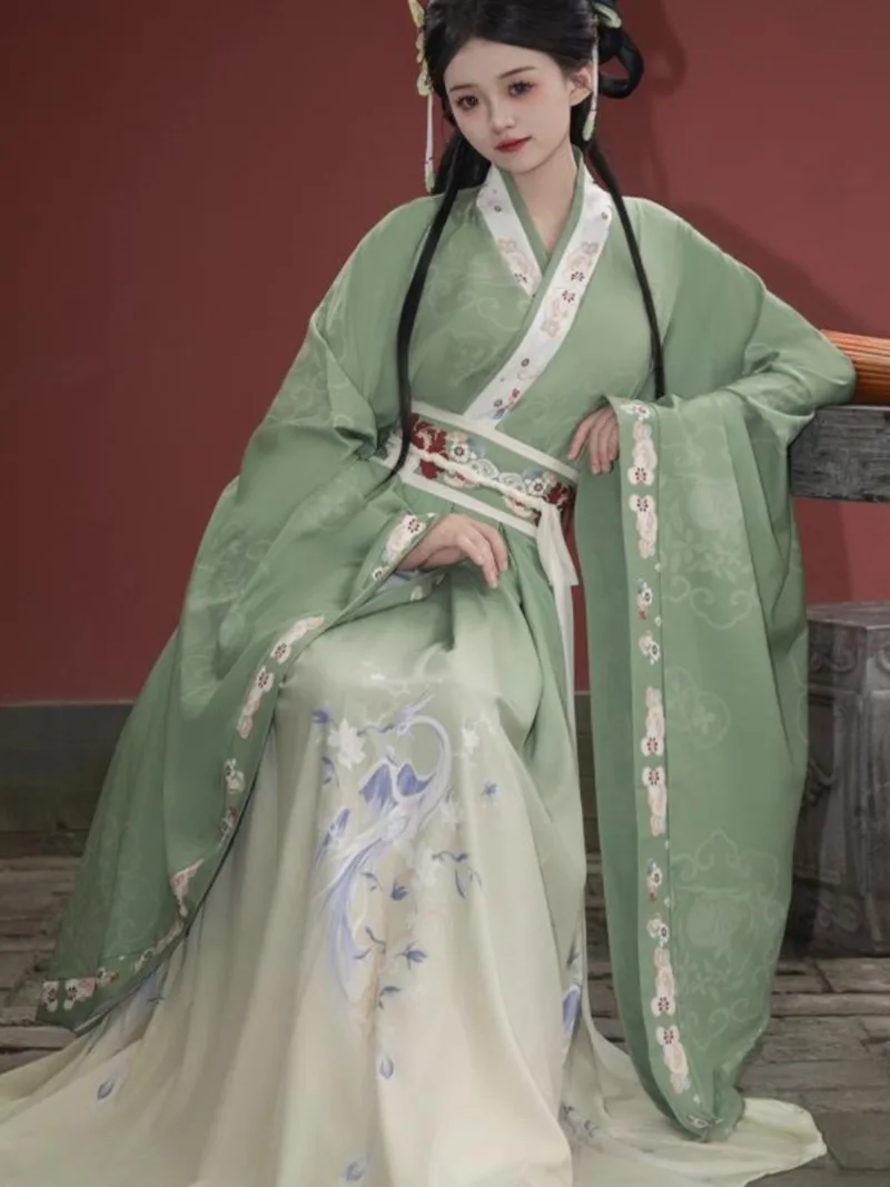 Elegant green hanfu dress with wide sleeves, flowing ancient Chinese style gown for women inspired by traditional beauty