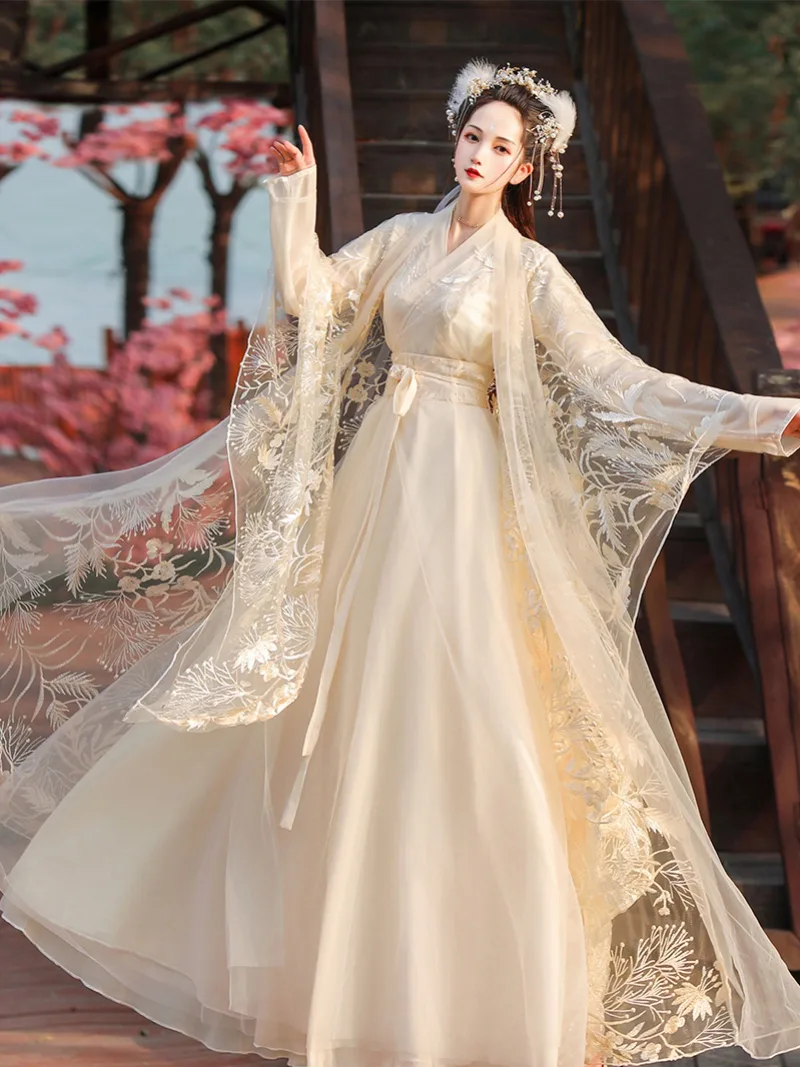Elegant Han Dynasty hanfu for women with cross-collar, flowing wide sleeves, and graceful traditional Chinese design