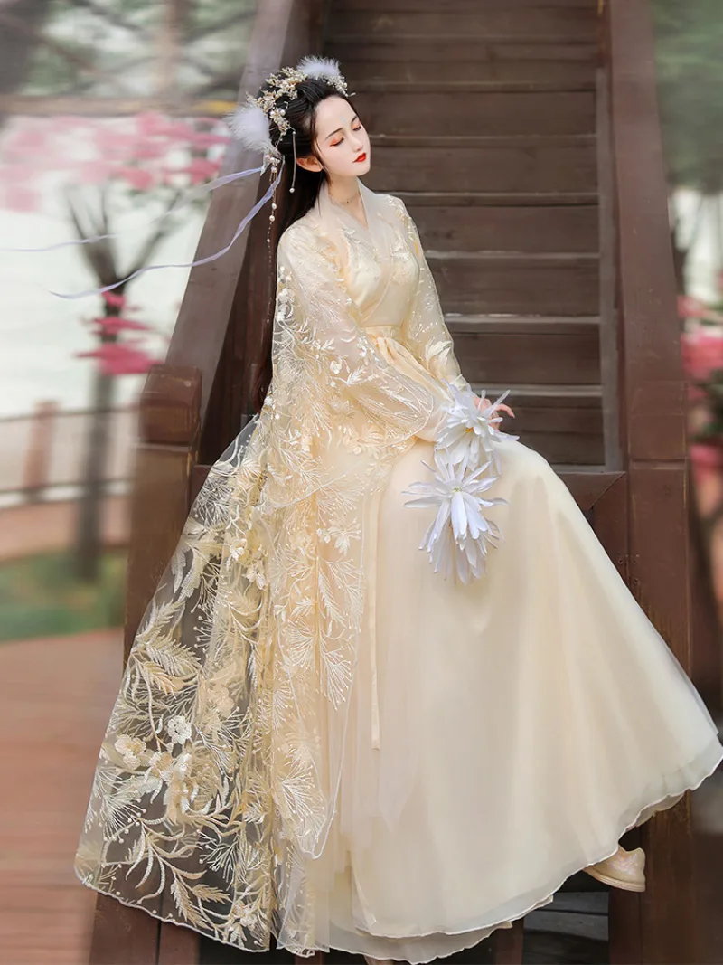 Elegant Han Dynasty hanfu for women with cross-collar, flowing wide sleeves, and graceful traditional Chinese design