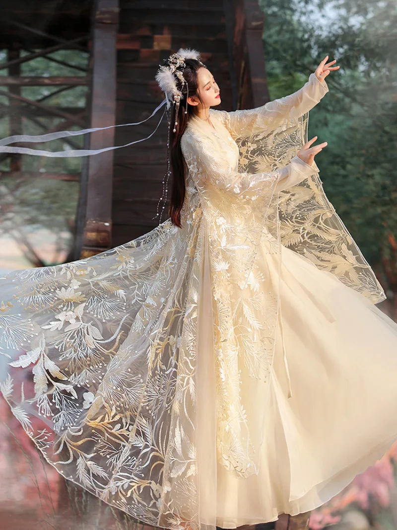 Elegant Han Dynasty hanfu for women with cross-collar, flowing wide sleeves, and graceful traditional Chinese design