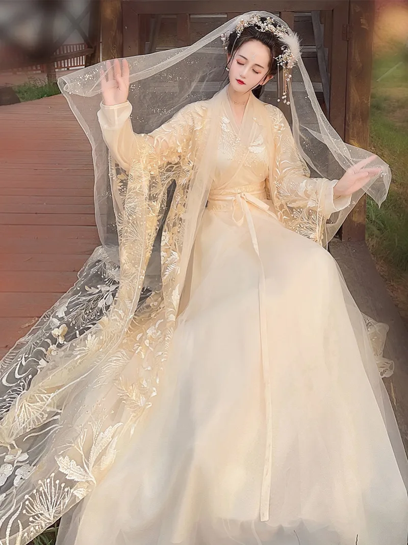 Elegant Han Dynasty hanfu for women with cross-collar, flowing wide sleeves, and graceful traditional Chinese design
