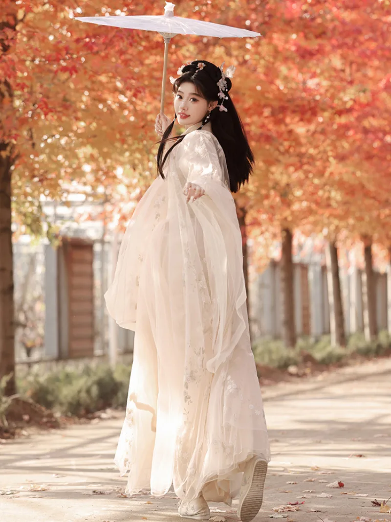 Elegant hanfu dress for women with wide sleeves, flowing fairy-style skirt, and graceful ancient Chinese design