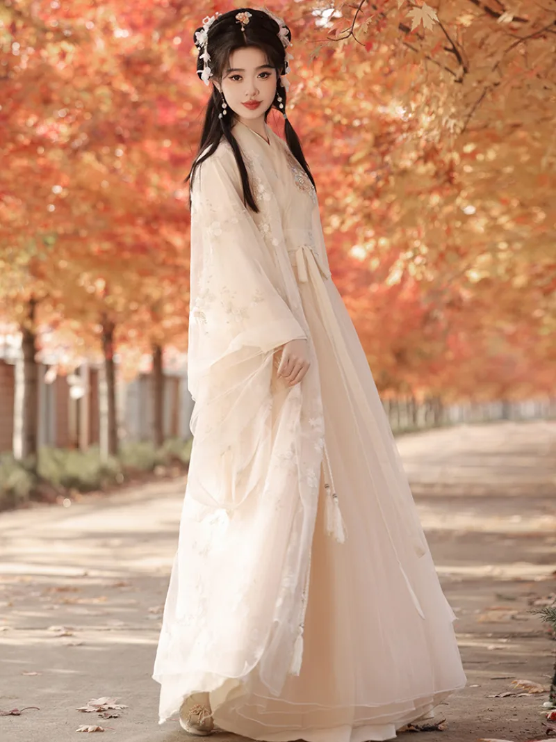 Elegant hanfu dress for women with wide sleeves, flowing fairy-style skirt, and graceful ancient Chinese design