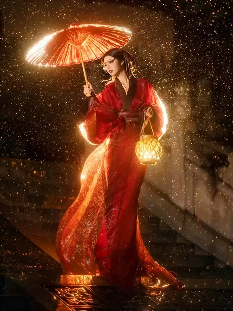 Red Hanfu dresses inspired by Warring States style with wide sleeves and straight hem for winter performances and cultural events