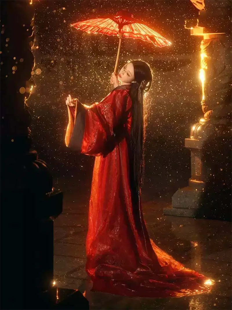 Red Hanfu dresses inspired by Warring States style with wide sleeves and straight hem for winter performances and cultural events