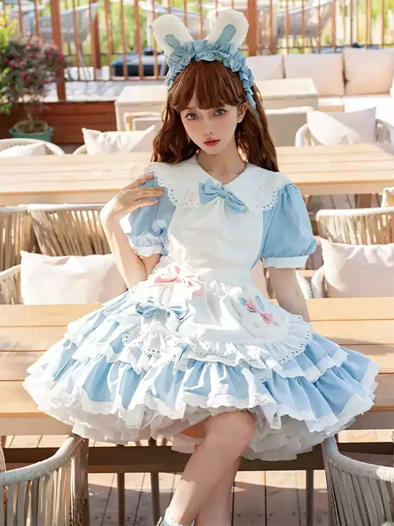 Classic black and white Lolita maid dress with lace apron and bow details, elegant original design