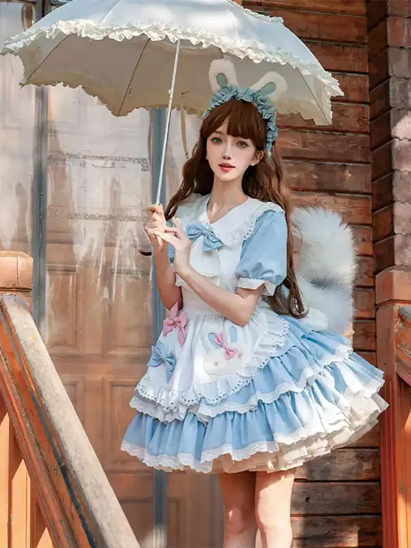 Classic black and white Lolita maid dress with lace apron and bow details, elegant original design
