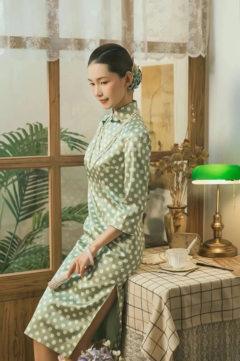Modern cheongsam dress showcasing elegant design, soft fabric, and the perfect balance between traditional charm and modern fashion.