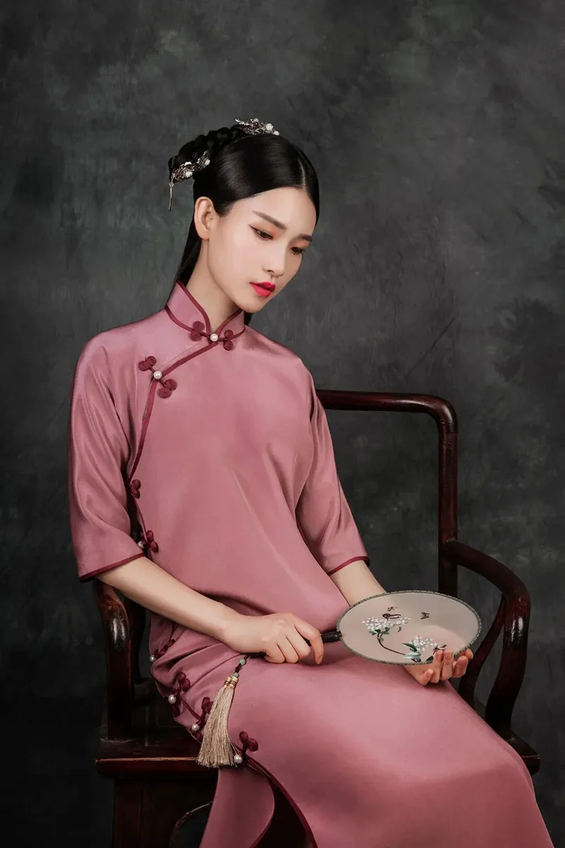 Modern cheongsam dress showcasing elegant design, soft fabric, and the perfect balance between traditional charm and modern fashion.