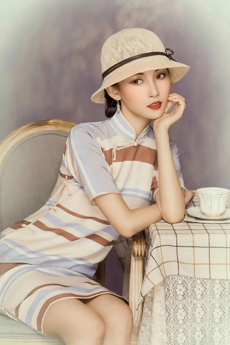 Modern cheongsam dress showcasing elegant design, soft fabric, and the perfect balance between traditional charm and modern fashion.