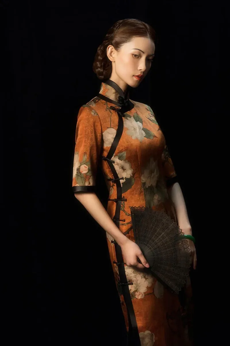 Modern cheongsam dress showcasing elegant design, soft fabric, and the perfect balance between traditional charm and modern fashion.