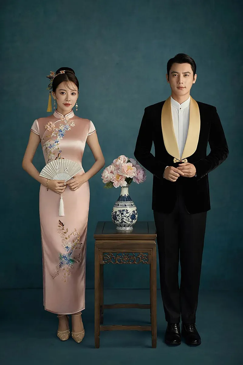 Qipao elegance captured in soft light, revealing the timeless grace of Chinese femininity.