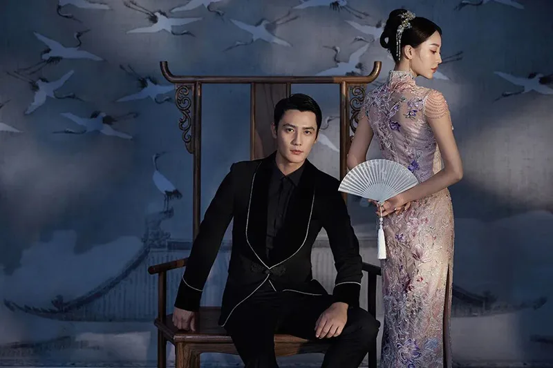 Qipao elegance captured in soft light, revealing the timeless grace of Chinese femininity.