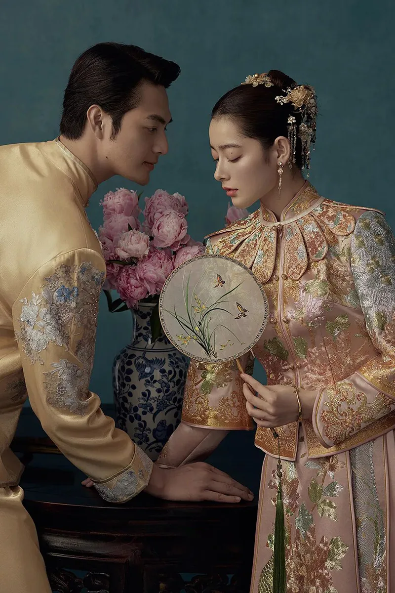 Qipao elegance captured in soft light, revealing the timeless grace of Chinese femininity.
