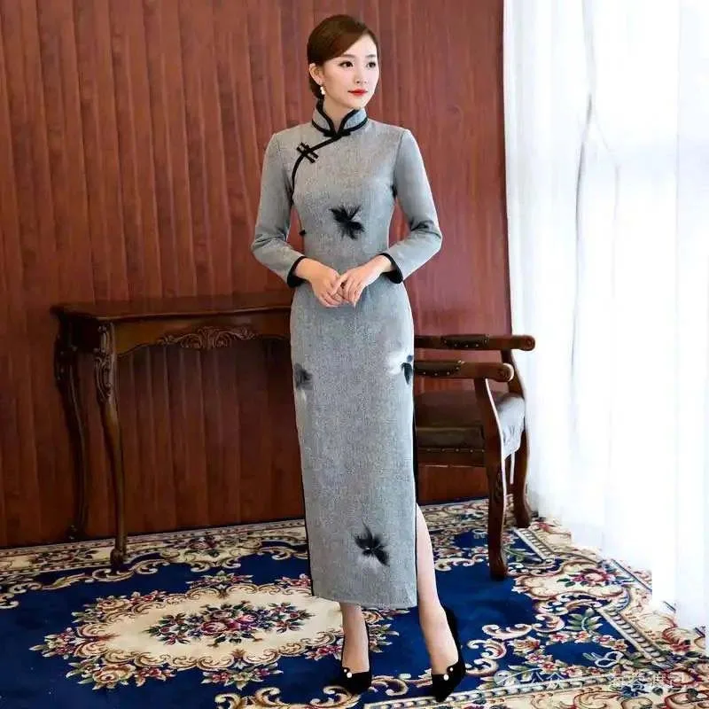 qipao-dress-2-3 Elegant woman wearing a traditional qipao dress, illustrating cultural taboos to avoid