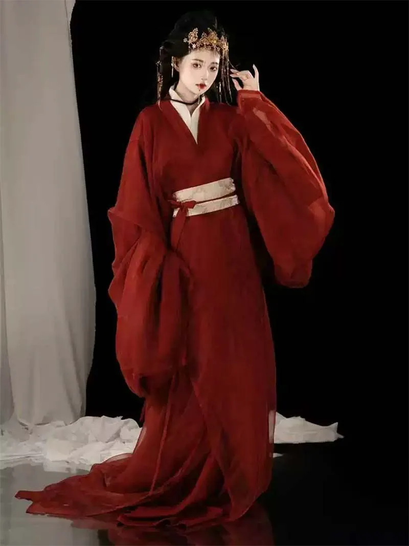 Red Hanfu Warring States robe with flowing long straight hem and cross-collar, elegant Chinese ancient style outfit for women