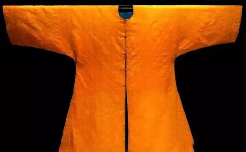 What Is A Tang Suit — traditional Chinese jacket with mandarin collar and frog buttons symbolizing elegance and culture