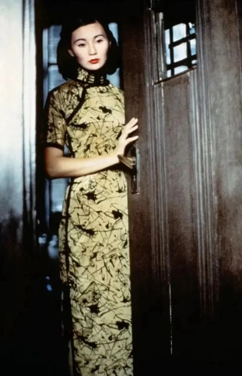 Woman qipao expressing traditional Chinese elegance and cultural heritage.