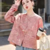 Pink Tang suit jacket with elegant embroidery and modern Chinese design for stylish women