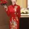 Embroidered wedding cheongsam in red satin with gold phoenix and peony design