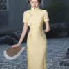 Goose yellow cheongsam with elegant jacquard details in modern Chinese styling
